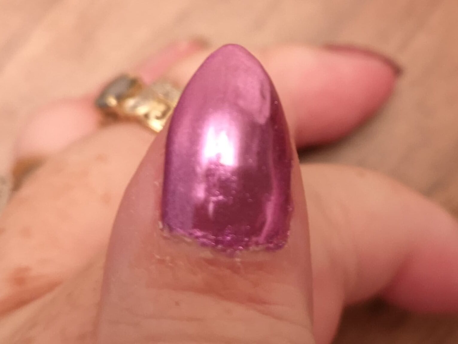 Fingernail with metallic nail powder collected at the cuticle. Sistaco Nail Set - The Solution For People With Dexterity Issues?  I Put It To The Test!